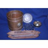 A copper bucket with an assortment of collectable metal wares and wooden shuttles etc