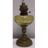 A vintage brass and glass oil lamp base. Shipping unavailable