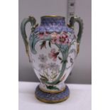 A hand decorated Royal Worcester two handled urn h15cm