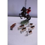 A vintage Beswick hunting scene group (damage to two dogs and nibble to foxes ear)