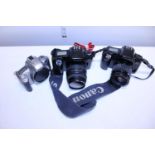 Two Canon digital SLR cameras and a Nikon (untested)