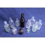 A selection of assorted antique glass bottles