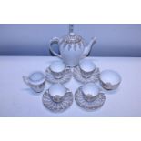 A Bone China tea service with 22ct gold decoration, chip to milk jug