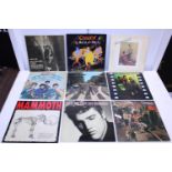 A selection of mixed genre LP records including The Beatles, The Rolling Stones, Queen etc