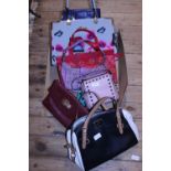 A selection of assorted ladies handbags etc