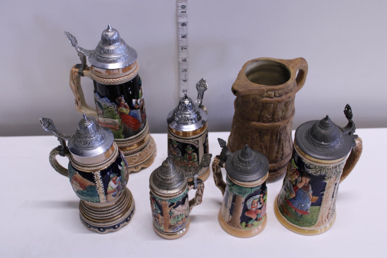 A job lot of vintage German steins etc