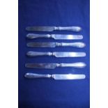 A set of six hallmarked silver butter knives