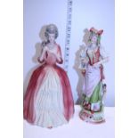 A pair of ceramic lady figurines h33cm