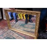 A large gilt bevelled edge mirror 90x65cm, shipping unavailable