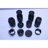 A selection of assorted camera lenses including Yashica etc