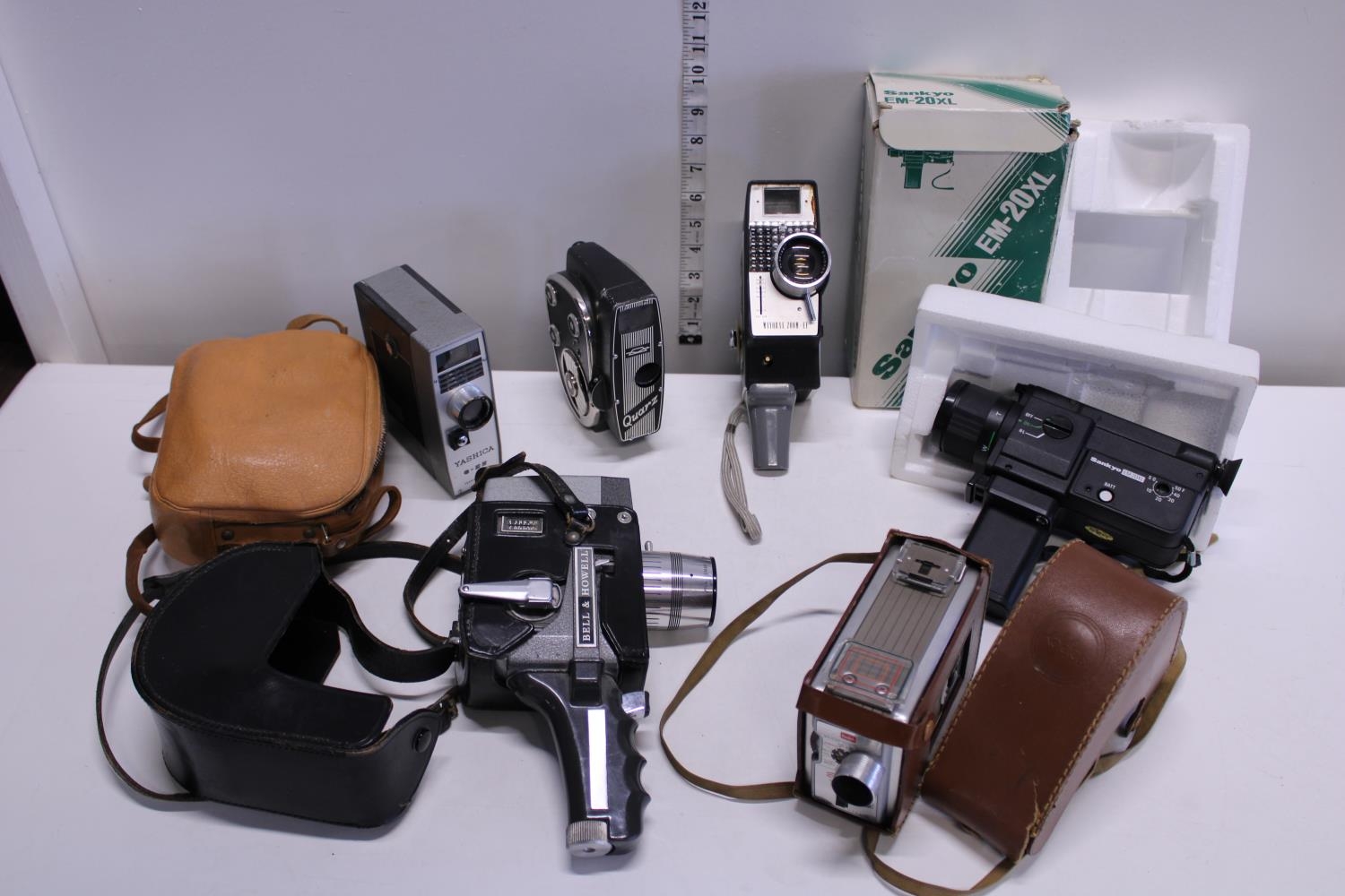 A selection of vintage Cine cameras including Bell and Howell etc