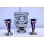 Two early 20th century plated bud vases with blue liners and a small ceramic planter