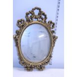 A small ornate gilt framed mirror, shipping unavailable