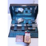 A cased vanity set and a travelling vanity set a/f