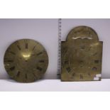 Two antique brass long case clock dials