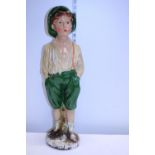 A 1920's chalk figure of a young boy