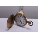 A vintage gold plated gold pocket watch manufactured by The Lancashire Watch Co