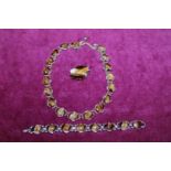 A three piece costume jewellery set Tigers Eye/Agate