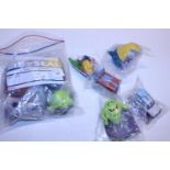Two complete sets of Ghost Busters toys for Burger King 1999