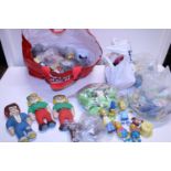 A bag full of miscellaneous collectors toys