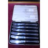 A cased set of hallmarked silver handled butter knives
