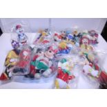 A box full of international McDonald's Disney related soft toys