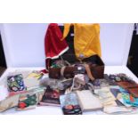 A vintage suitcase full of vintage scouting ephemera
