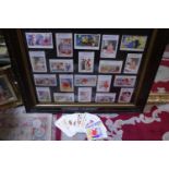 A framed selection of humorous postcards and selection of loose humorous postcards (67 loose in