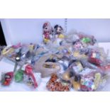 A large selection of sealed McDonald's Disney themed toys