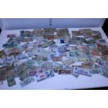 A large selection of vintage world banknotes