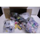 A box full of miscellaneous McDonald's toy sets