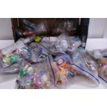 A box full of assorted Mc Donald's Toy sets