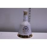 A sealed bottle of Bell's Whisky dated June 1982 50cl