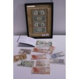 A selection of assorted World Bank notes and framed four dollar note set