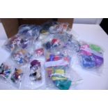 A box full of assorted McDonald's toy sets made for the Australian market