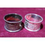 A pair of hallmarked silver napkin rings. 59 grams