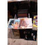 A box of mixed genre LP records. Shipping unavailable.