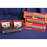 Three boxed Hornby 00 gauge carriages and other models