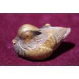 A 19th Century Japanese boxwood netsuke in the form of a Mandarin duck