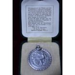 A cased Silver life saving medal dated 1935