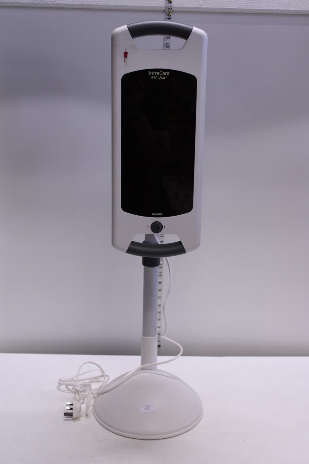 A large infrared care lamp (in working order), shipping unavailable