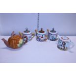 A collection of novelty teapots by Christopher Wren and one other