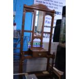 A large Edwardian wooden hall stand. Postage unavailable