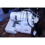 A Baby Tack electric sewing machine (untested) Postage unavailable