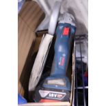A boxed Bosch Cordless 18 volt grinder working with spare battery