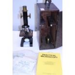 A vintage quality microscope made by R&J Beck Ltd of London. along with spare lenses etc