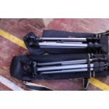Two good quality cased camera tripods