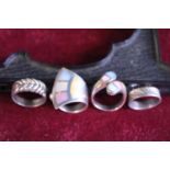 Two 925 silver rings & two white metal rings