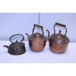 Three assorted vintage copper kettles