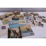 A selection of vintage postcards, sweet heart cards & Cunard/White Star items